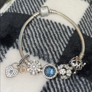 Pandora bracelet with charms included